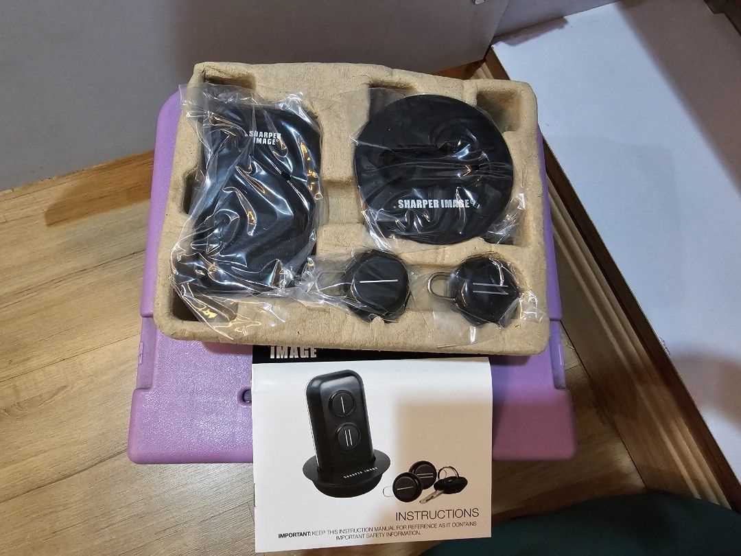 sharper image portable electronic key finder instruction manual